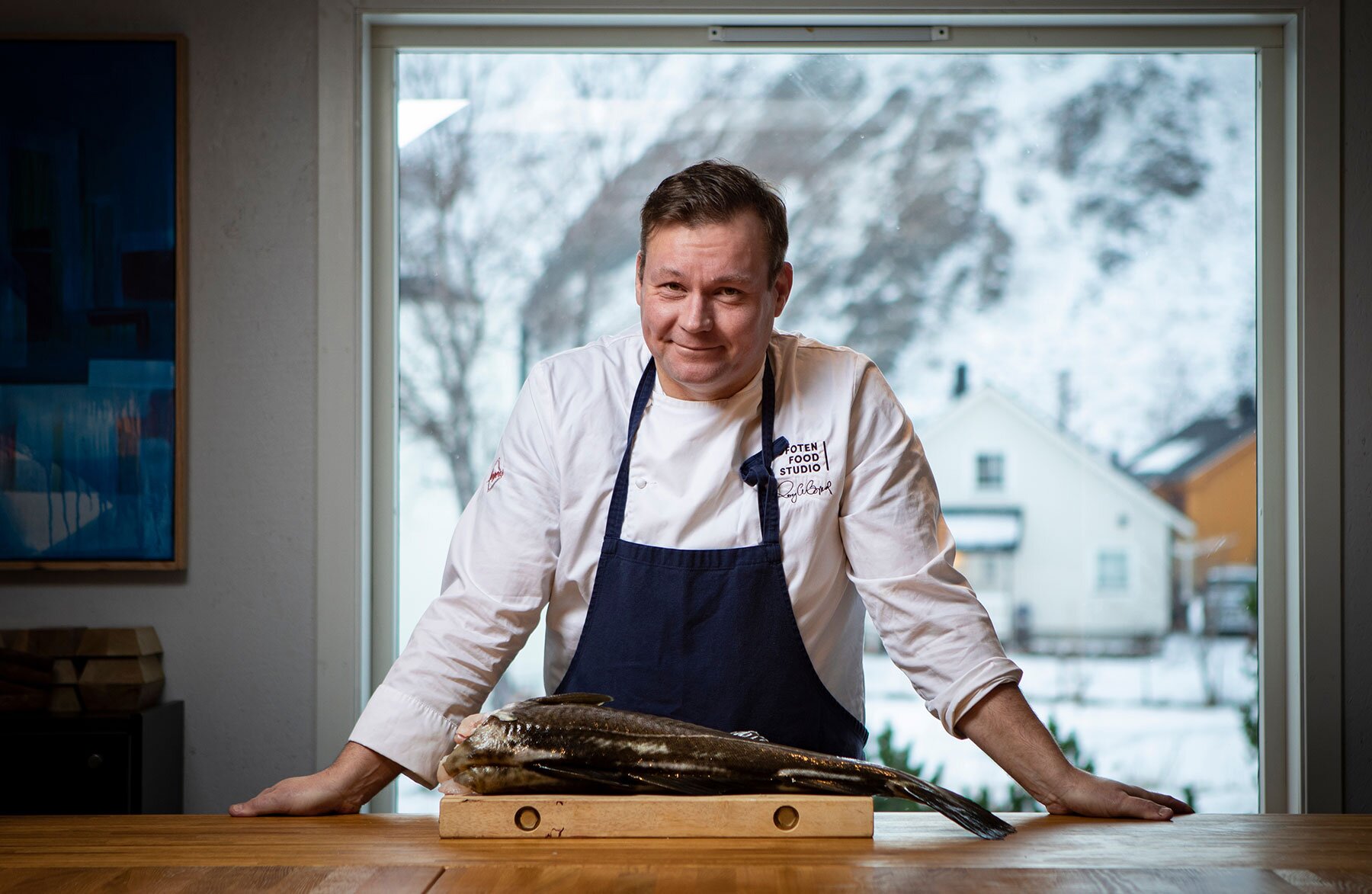 Chef in the kitchen with skrei